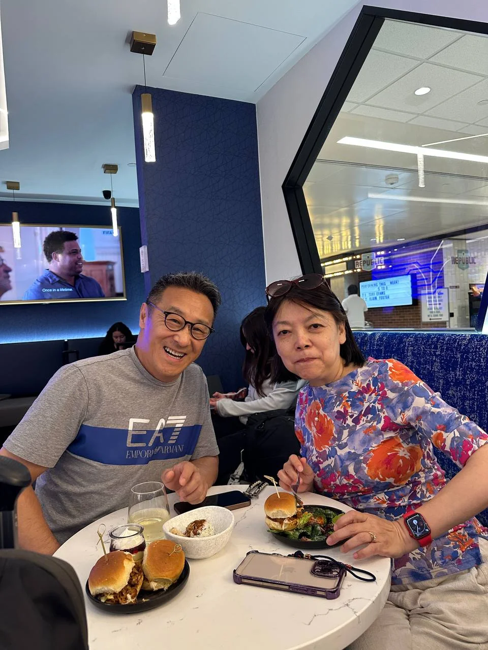 Travel companions sharing dinner in the MSP Portal Lounge