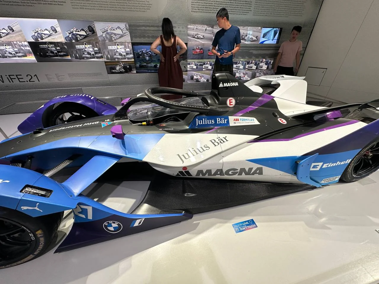 BMW race cars displayed together at the BMW Museum