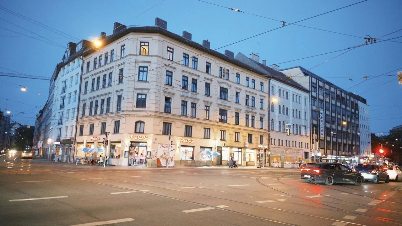 Munich downtown street glowing in the early evening