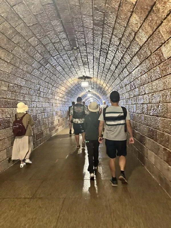 Stone tunnel leading toward the Eagle's Nest elevator