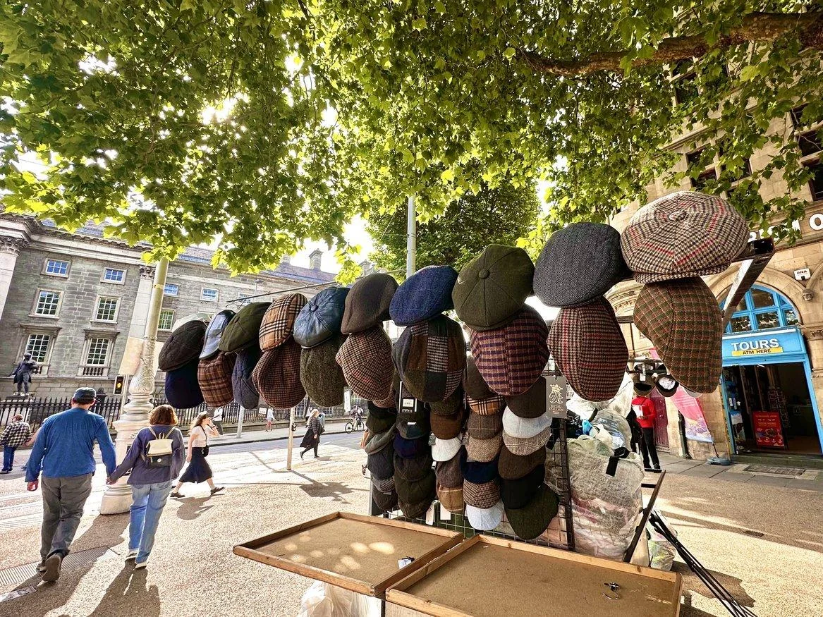 Colorful knit hats displayed at a Dublin street stall