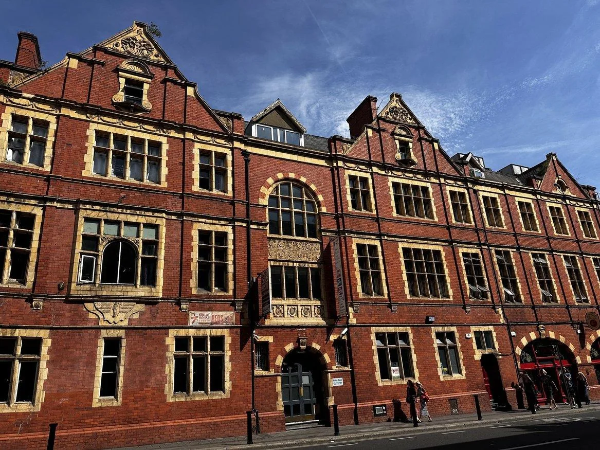Sunlit red-brick historic building in Dublin
